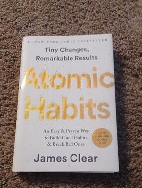 Atomic Habits by James Clear — White & Gold Hardcover